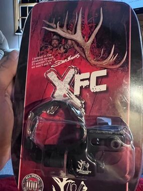 - Black Trophy Taker XFC Fall-Away Rest for compound bows.